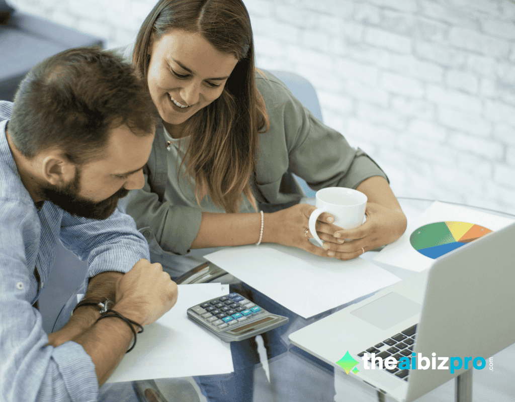 Two small business owners discussing strategy and a pie chart, using personalized marketing AI insights on a laptop.